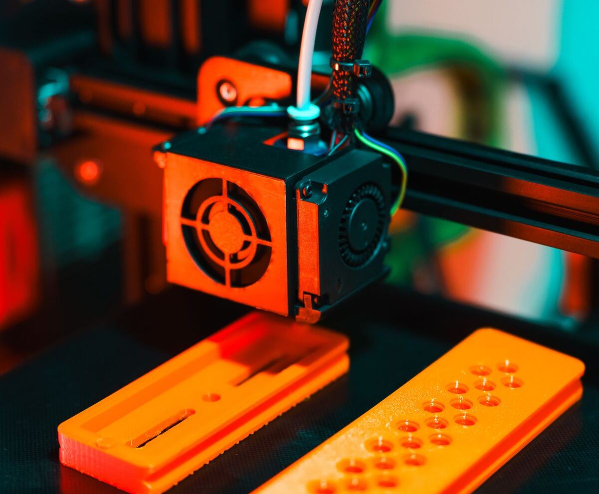 Printer toolhead printing bright orange parts