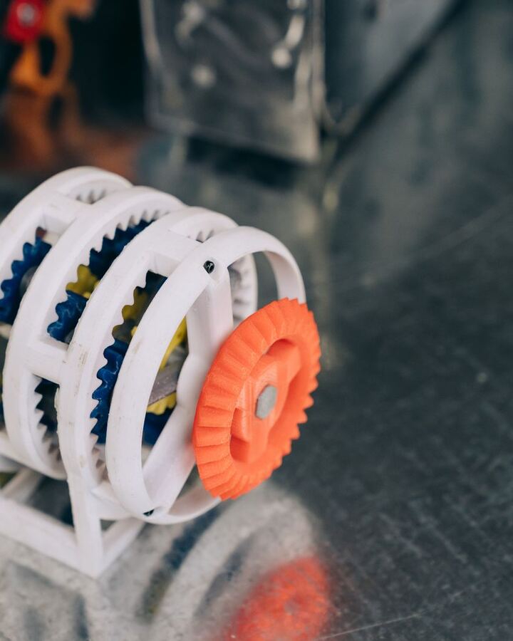 Printed gear mechanism with an orange gear